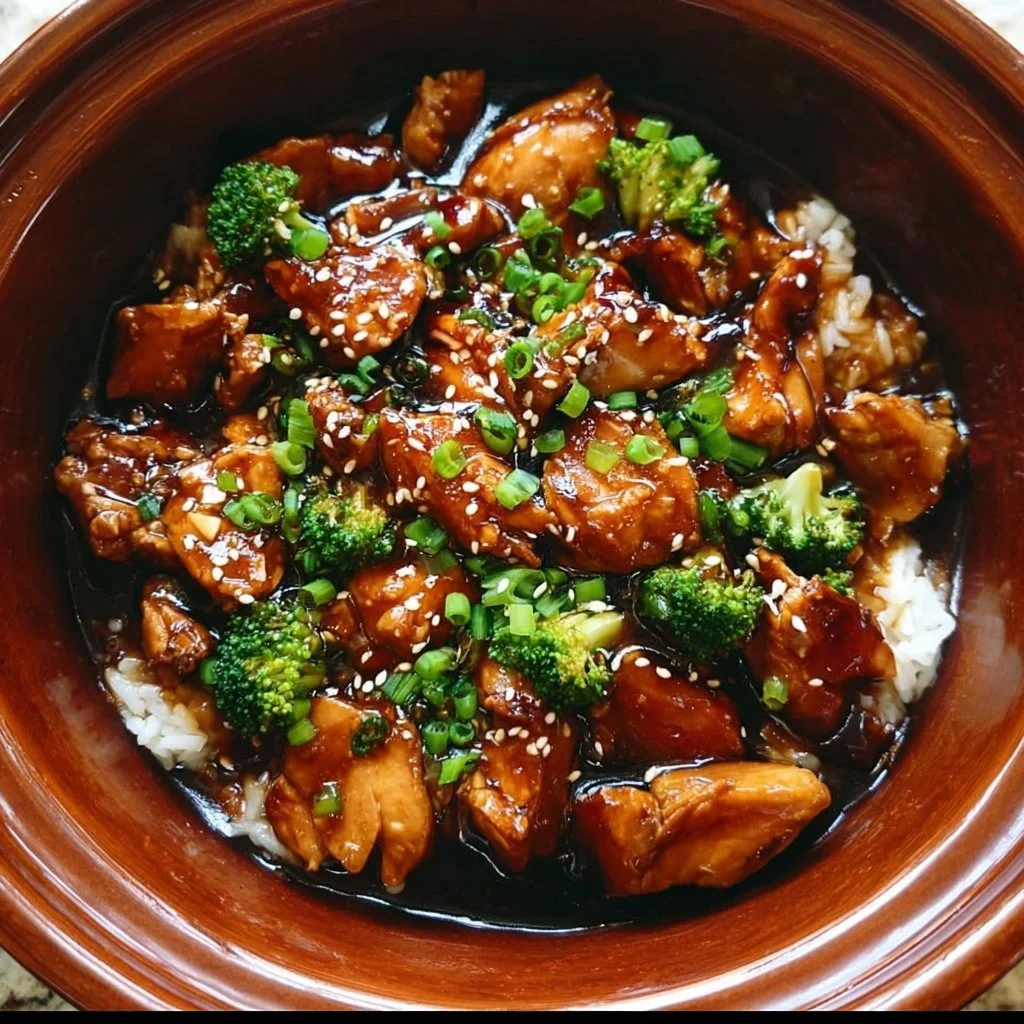 Crockpot Teriyaki Chicken in a bowl, showcasing its savory glaze and tender pieces.